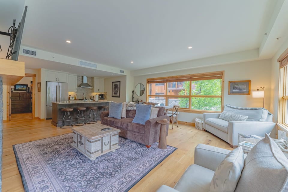 Open living area connecting kitchen and dining space