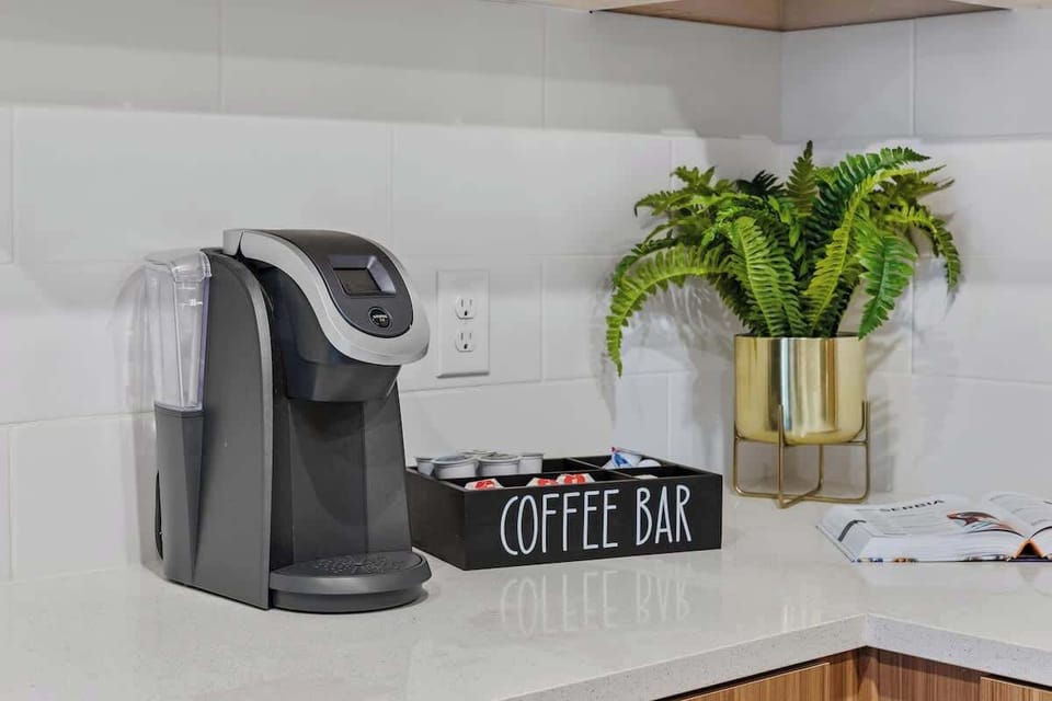- Coffee bar setup with Keurig and assorted brews ready to enjoy  
- Bright counter space perfect for morning routines and quick drinks  
- Warm inviting touch adding convenience to your kitchen stay  