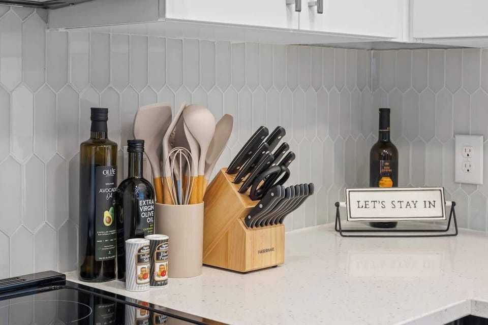 
- Kitchen counter stocked with cooking oils and utensils  
- Organized setup for easy home-style meals  
- Thoughtful touches enhancing your stay experience  
