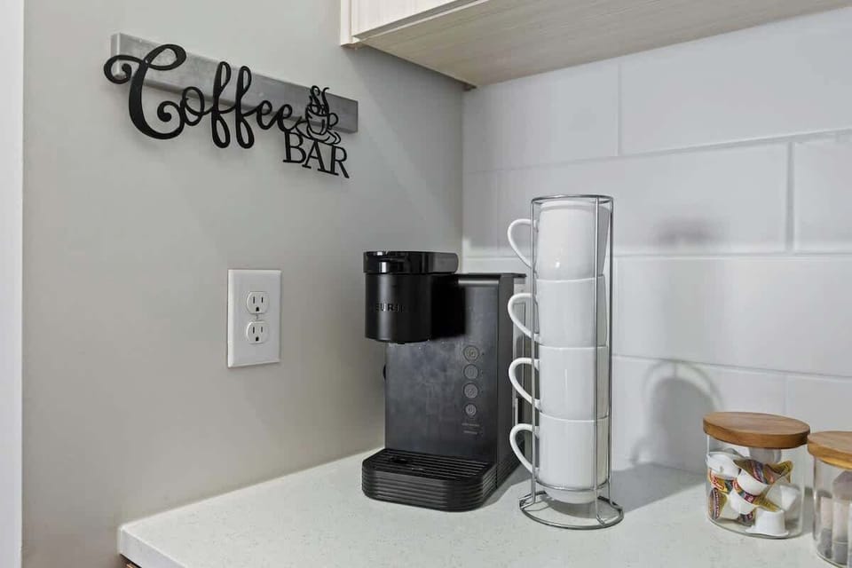 - Convenient coffee bar setup with brewer and essentials ready for mornings  
- Guest friendly station perfect for short term rental stays  
- Easy grab and go design for quick caffeine boosts  
