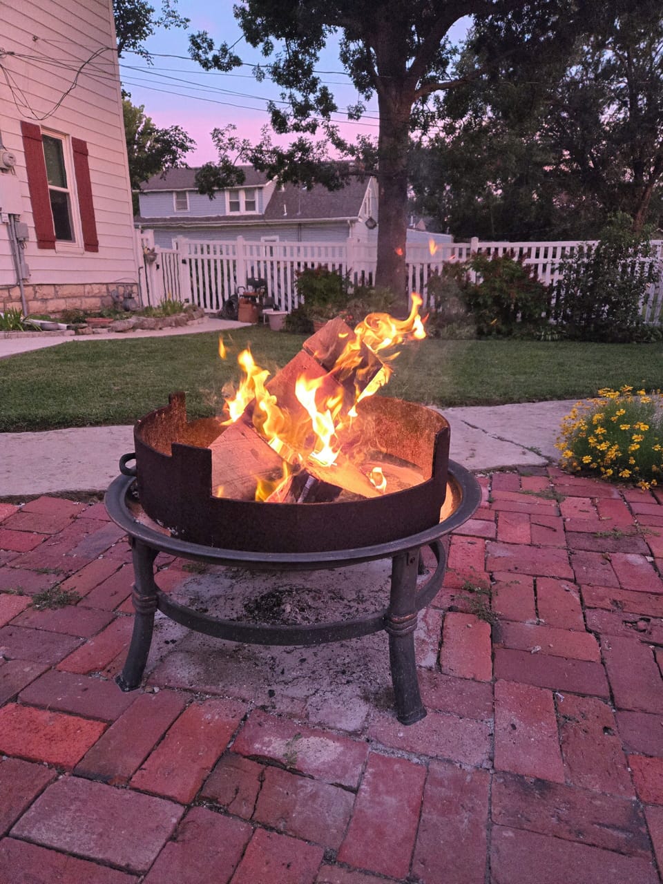 shared patio with f8re pit and Blackstone grill