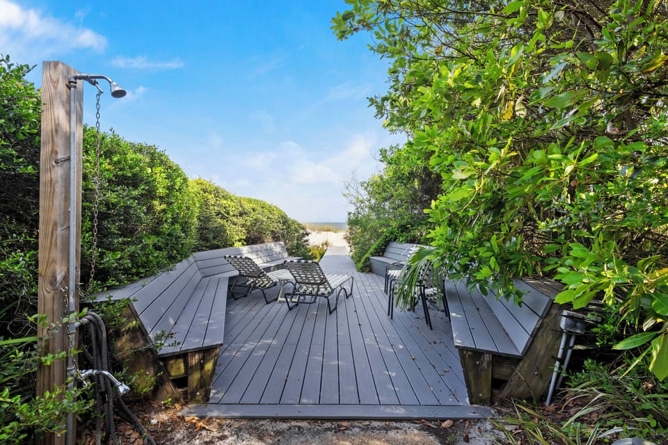 Oceanfront location in highly desirable Sea Pines with a private beach path for effortless sun and surf access