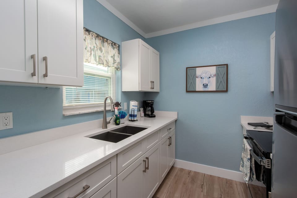 Fully Equipped & Updated: Includes full-size fridge, stove, microwave, and essential cookware.