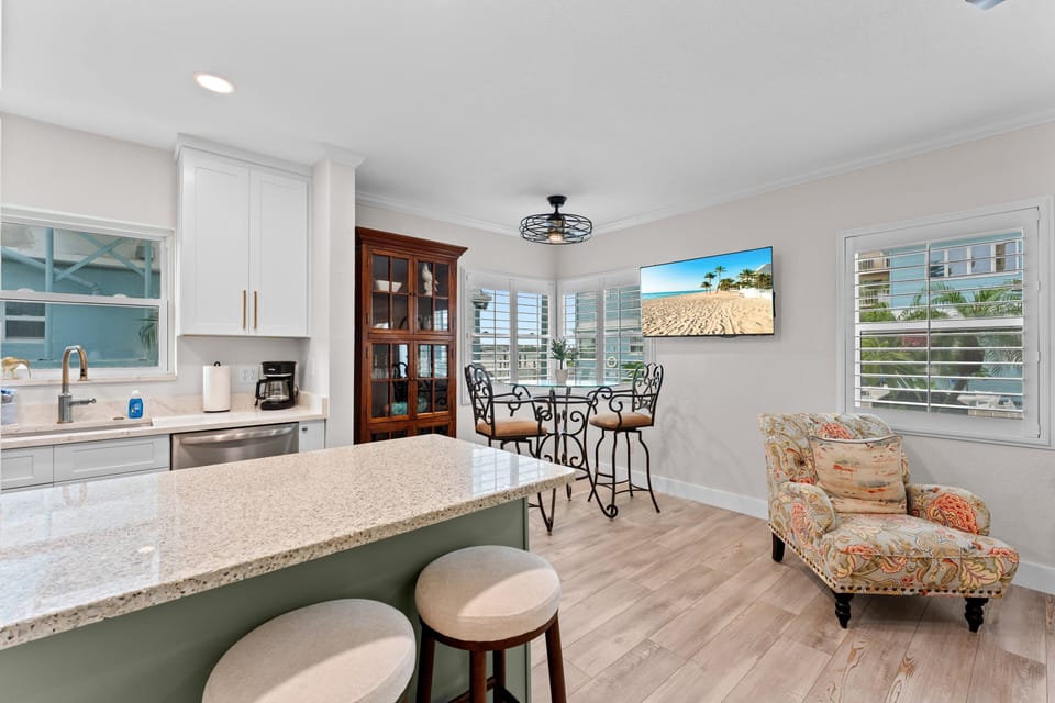Enjoy a bright and inviting space for dining, relaxing, or planning your next beach day with family and friends.