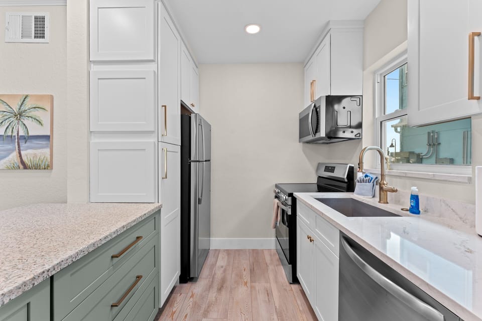 The fully equipped kitchen offers everything needed to prepare meals, snacks, and morning coffee during your stay.