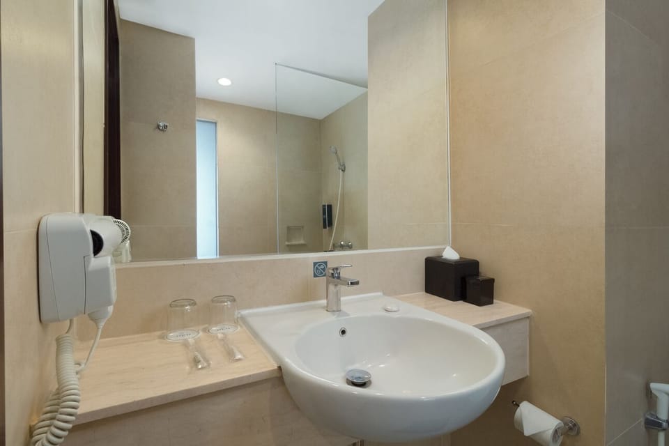 Standard Room | Bathroom | Free toiletries, slippers, towels