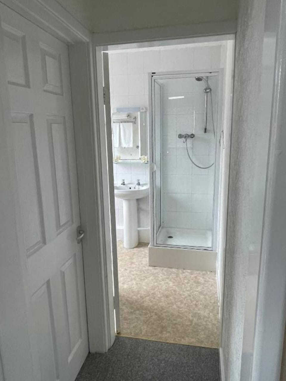 Shower, free toiletries, towels, toilet paper