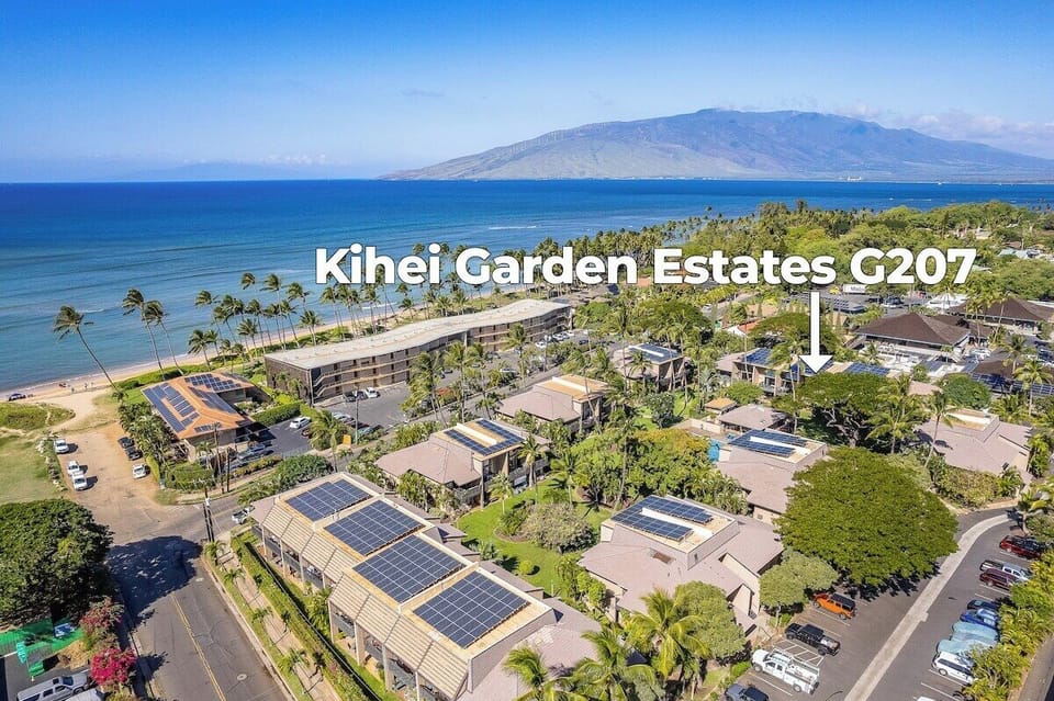 Aerial view of Kihei Garden Estates showing lush tropical grounds and pool area.