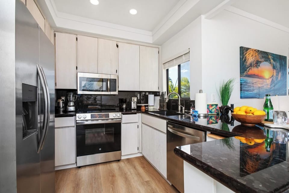 This stylish kitchen is more than just good looks, fully equipped, sparkling clean, and ready for your next feast   