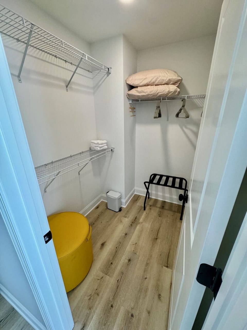 Walk-in closet, in primary bedroom.