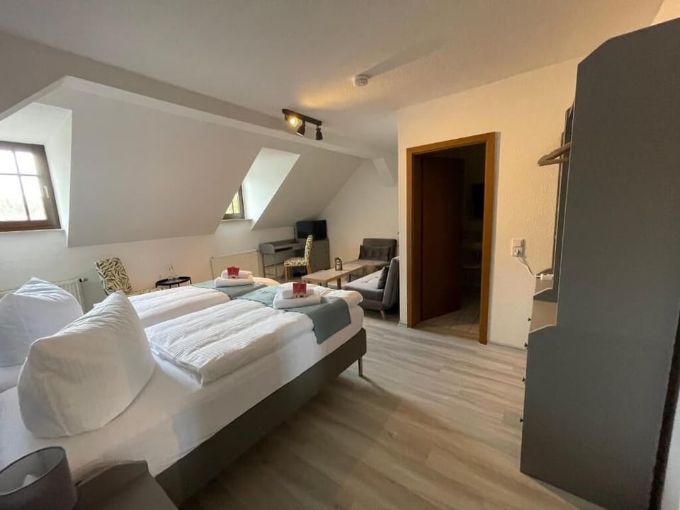 Family Studio, 2 Twin Beds, Private Bathroom, Resort View | Premium bedding, individually decorated, individually furnished, desk