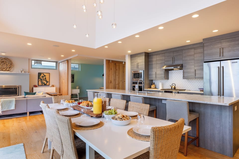 Additional barsool seating at the kitchen counter.