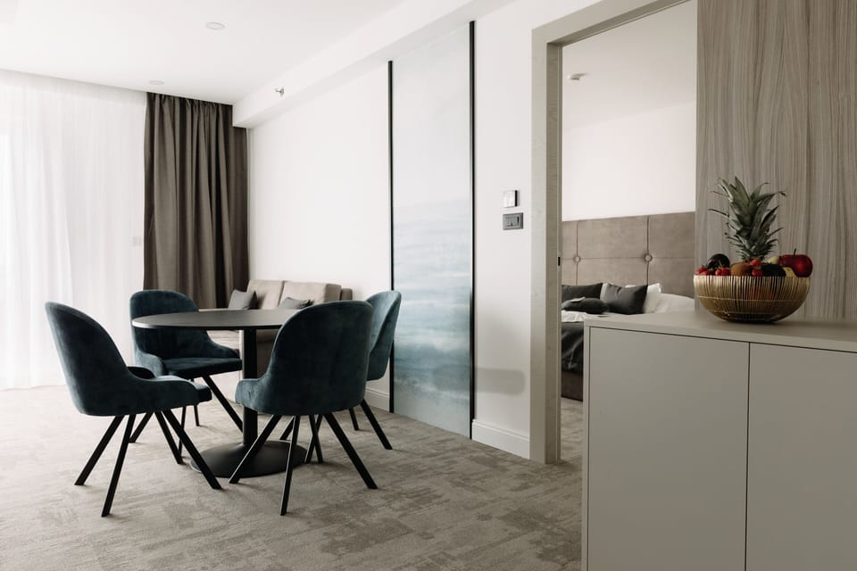 Junior Suite with balcony and sea view | Minibar, in-room safe, desk, laptop workspace