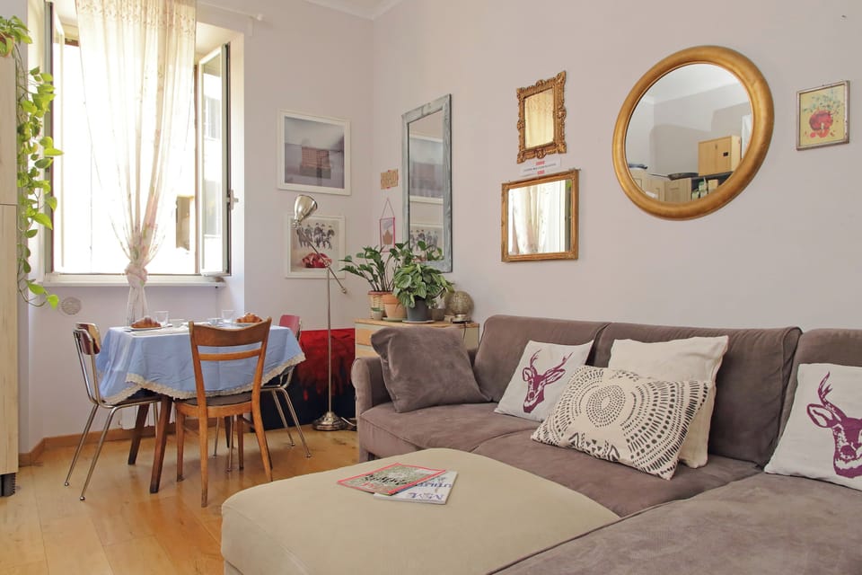 Apartment (1 Bedroom) | Living area | 32-inch Smart TV with cable channels