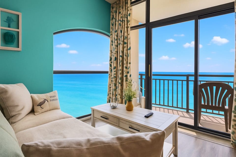 Enjoy a serene oceanfront experience from this top floor penthouse end unit.