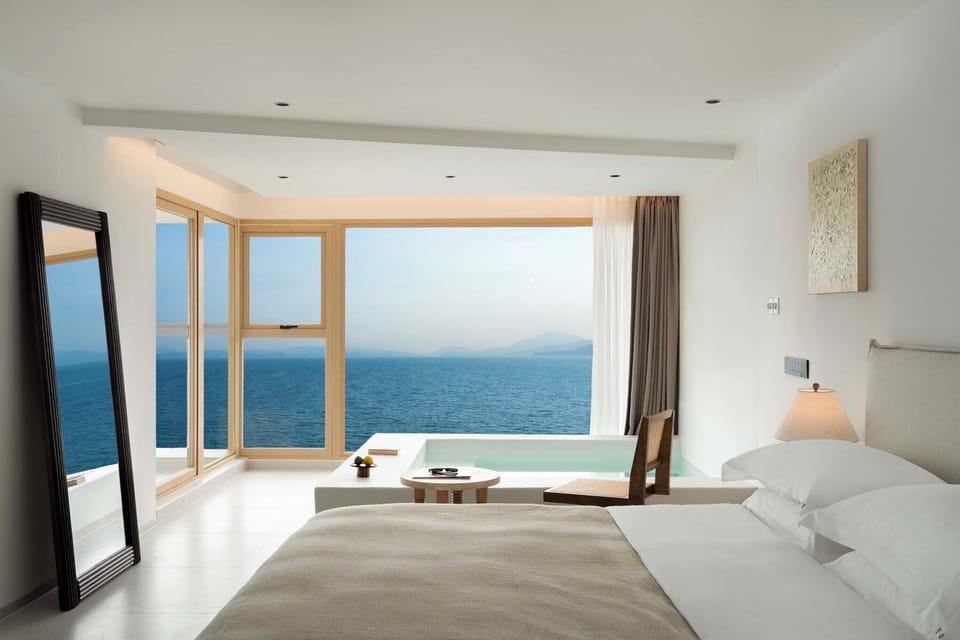Superior Double Room, Balcony, Sea View | Living area | Video library, printers