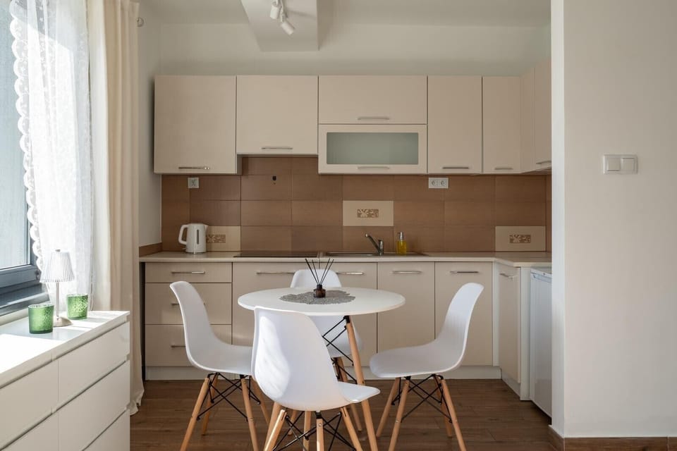 Deluxe Studio Suite, Balcony, City View | Iron/ironing board, free WiFi