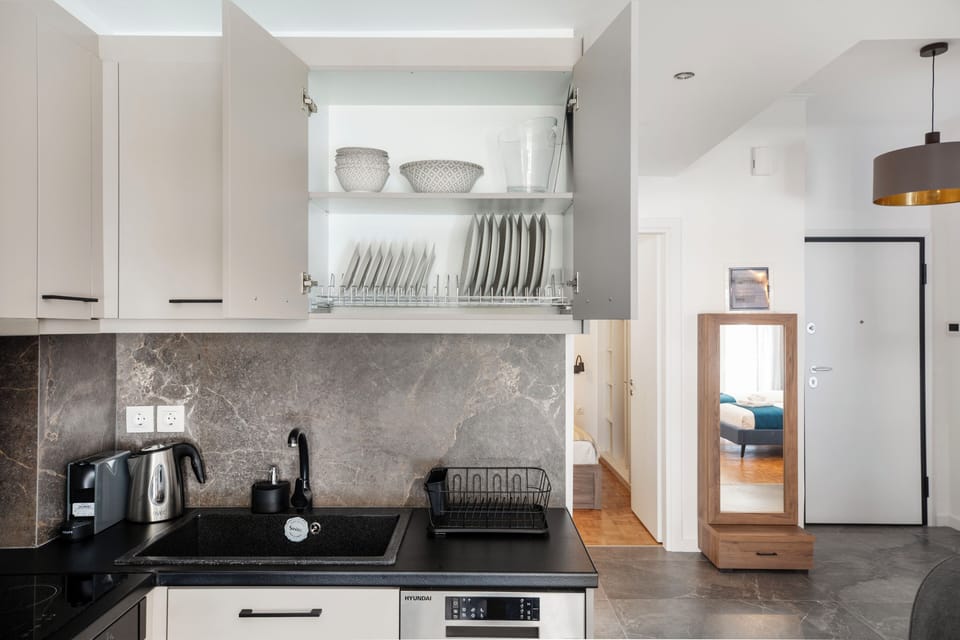Apartment, 2 Bedrooms, Balcony, City View | Private kitchen | Full-size fridge, oven, stovetop, dishwasher