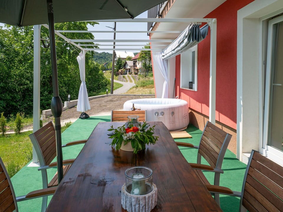 Furniture, Outdoor Furniture, Chair, Table, Outdoor Table, Shade, Umbrella, Kitchen & Dining Room Table, Outdoor Structure, Resort