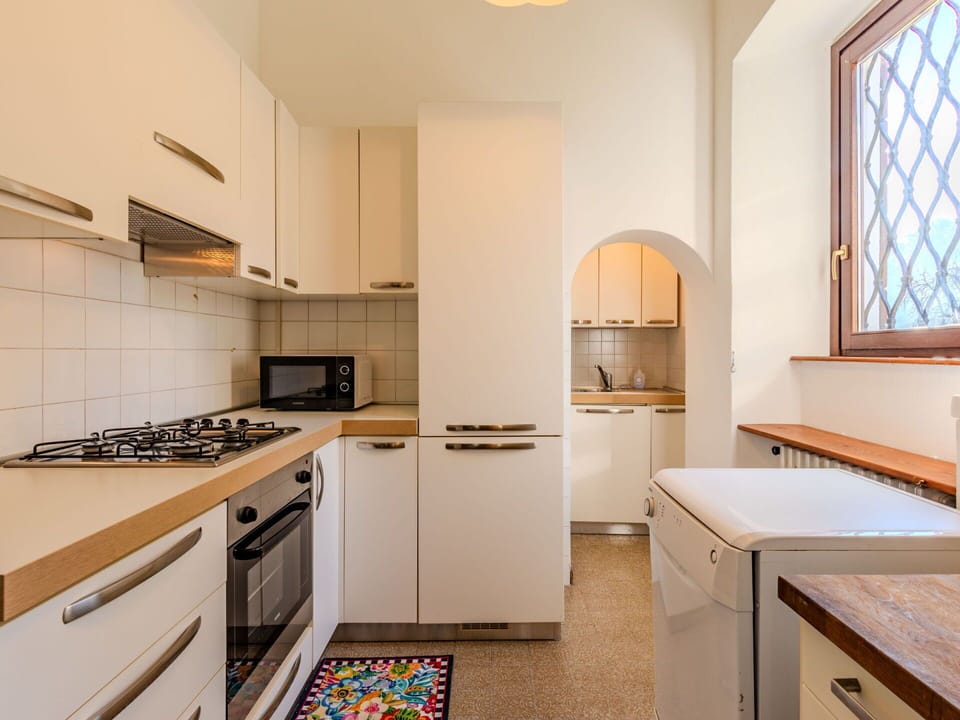 Furniture, Interior Design, Flooring, Wood, Ceiling, Floor, Chair, Table, Apartment, Lighting