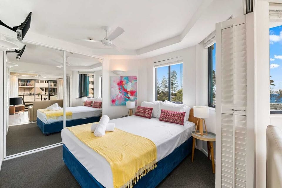 Bedroom has a queen bed