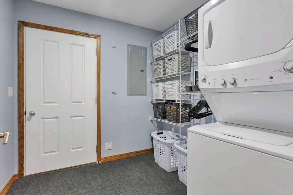 Convenient laundry room equipped with a washer and dryer—just like home.