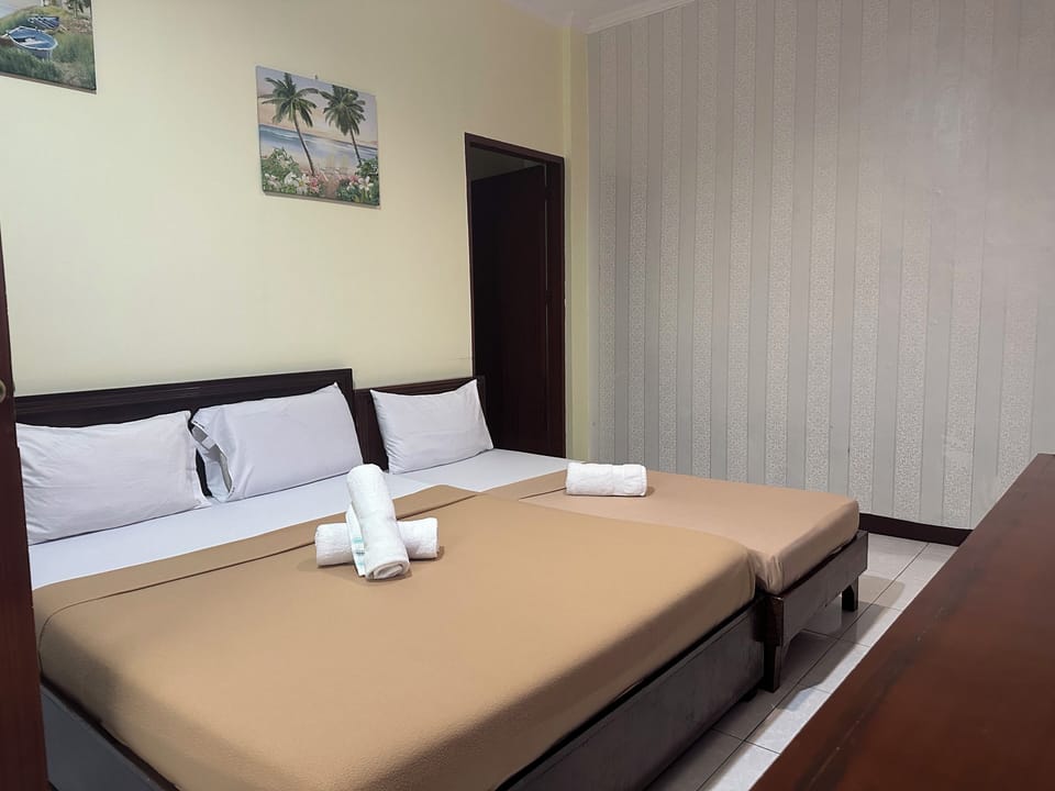 Family Room, Multiple Beds | In-room safe, desk, laptop workspace, free WiFi