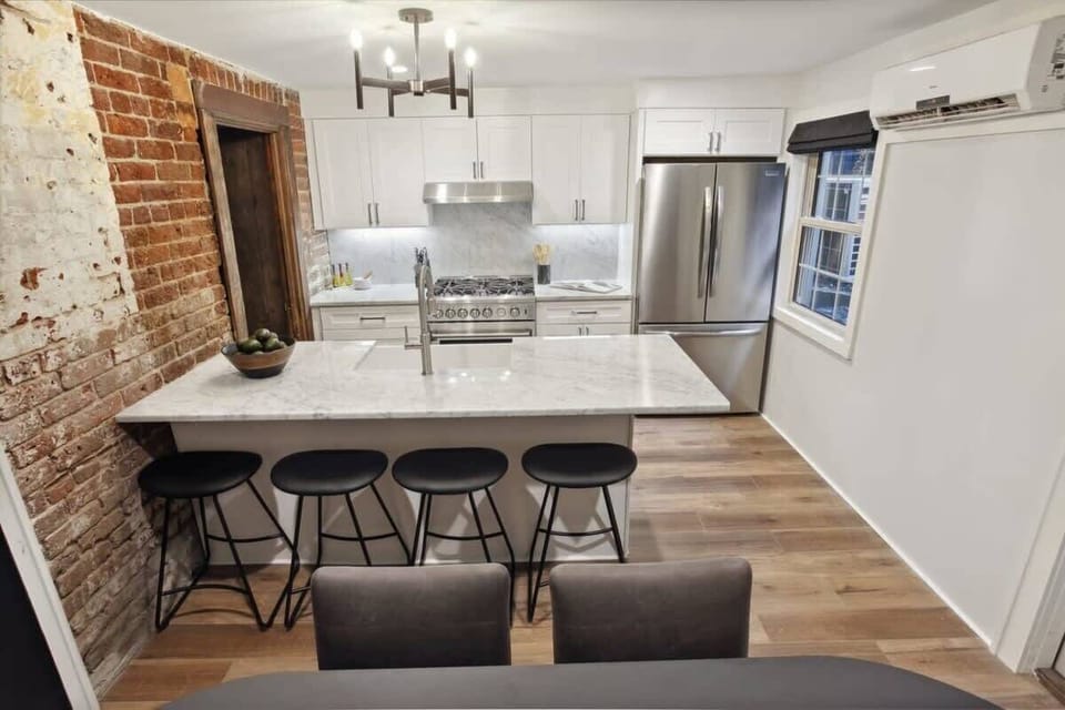 Kitchen Unit 1 | Kitchen with Island and Bar Seating | Unit 1 — Garden Level — Unit on One Level