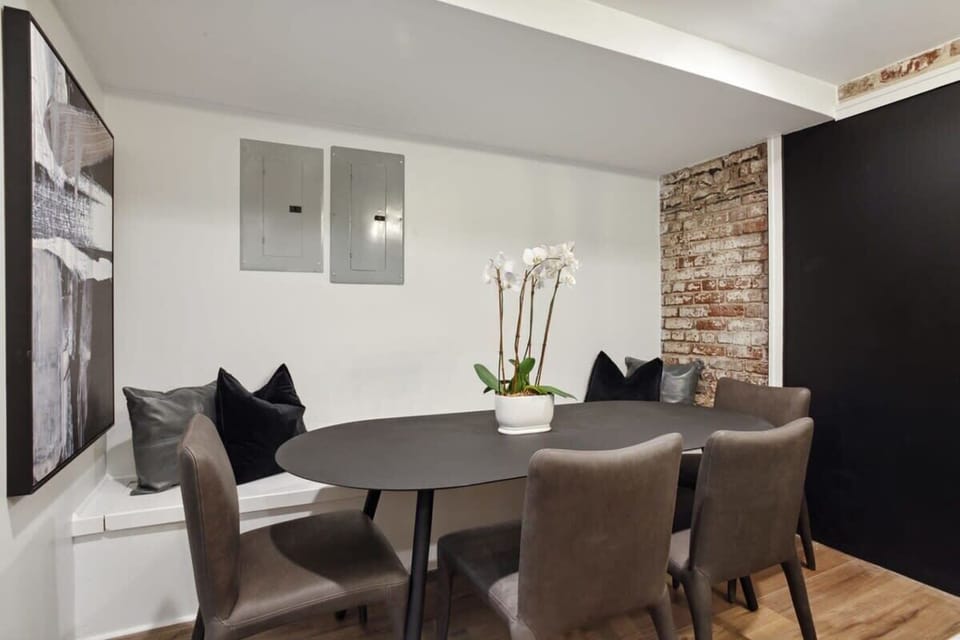 Dining Area Unit 1 | Open Concept Dining Area with Exposed Beam Ceiling | Unit 1 — Garden Level — Unit on One Level