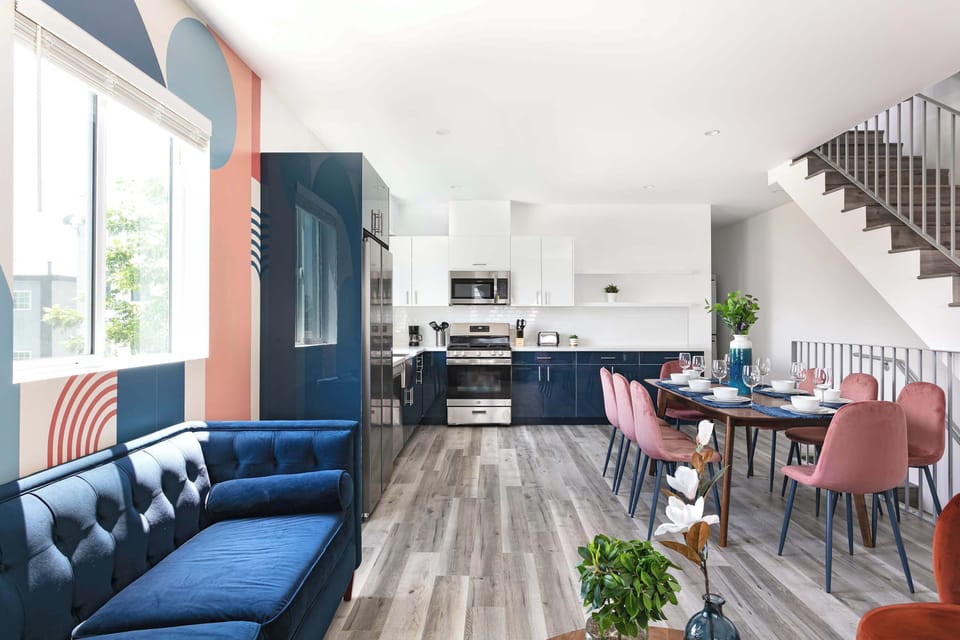 Open living space with sectional sofa and dining area