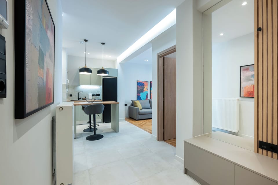 Modern, stylish open-plan space with elegant lighting and vibrant decor.