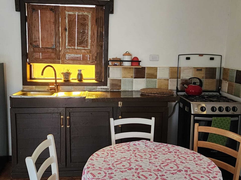 Comfort Cabin, Patio, Mountain View | Private kitchen | Eco-friendly cleaning products