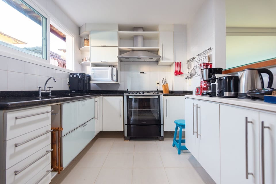 Villa | Private kitchen | Fridge, microwave, electric kettle, cookware/dishes/utensils