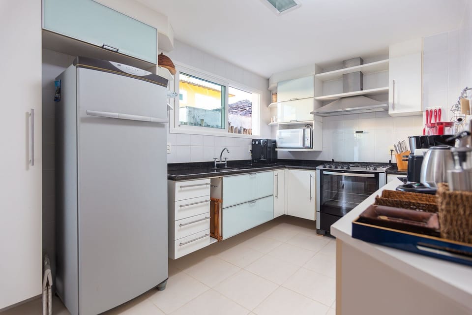 Villa | Private kitchen | Fridge, microwave, electric kettle, cookware/dishes/utensils