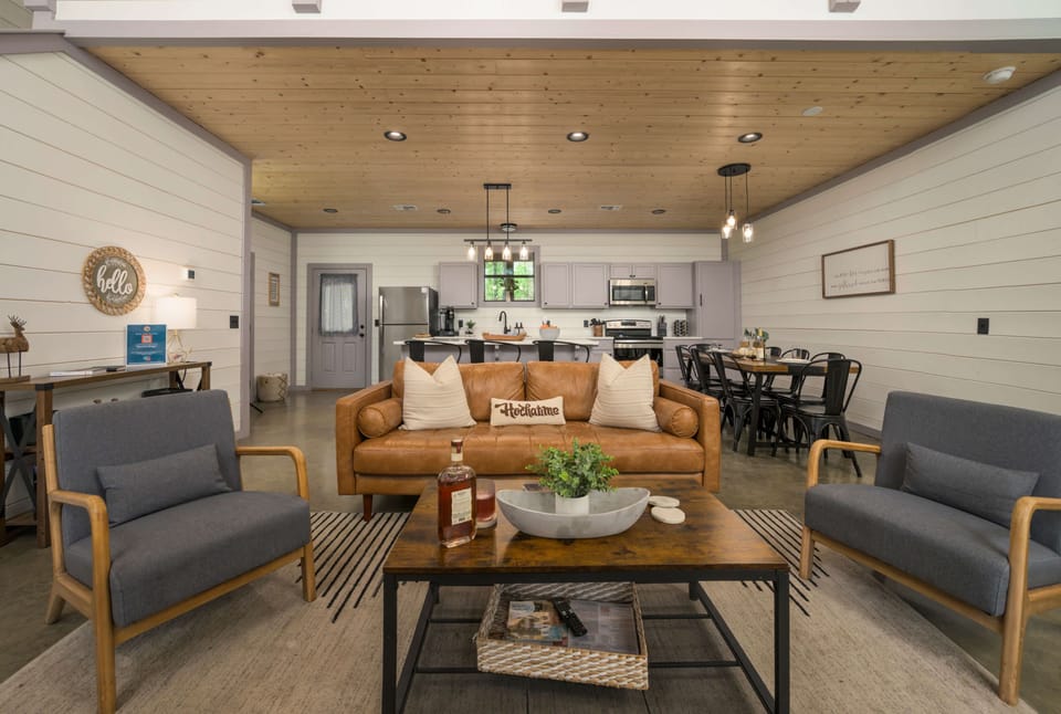 Experience cozy modern luxury with warm wood, open spaces in Broken Bow, OK.