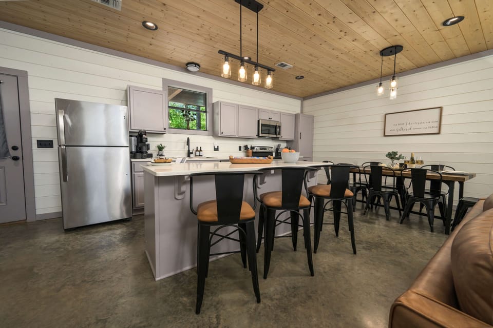 Bright and cozy modern farmhouse kitchen with an island