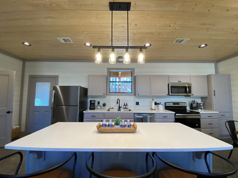Bright and cozy modern farmhouse kitchen with an island