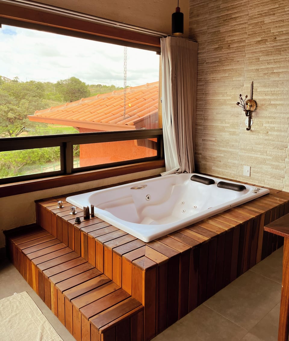 Romantic Double Room, Jetted Tub | Minibar, WiFi (free), bed sheets