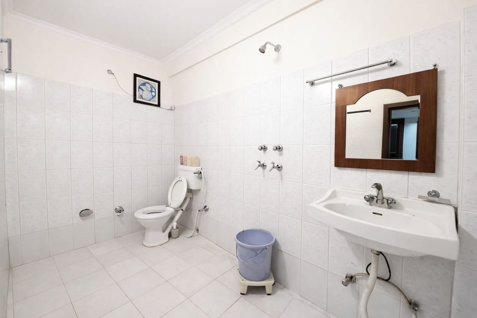 Deluxe Double Room, Multiple Beds | Bathroom | Shower, rainfall showerhead, free toiletries, slippers