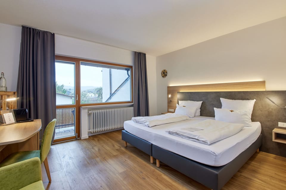 Deluxe Double Room, 1 Bedroom, Balcony | Minibar, desk, blackout drapes, free WiFi