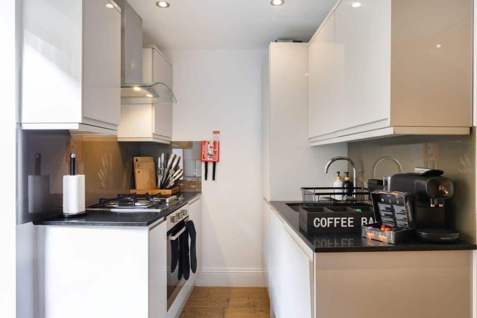 Modern, fully equipped kitchen with everything you need to prepare home-cooked meals and enjoy dining together in comfort