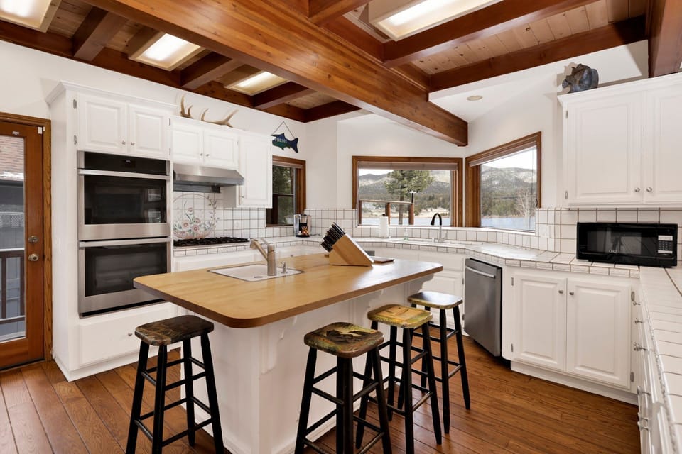 Open kitchen with island and seating for 4