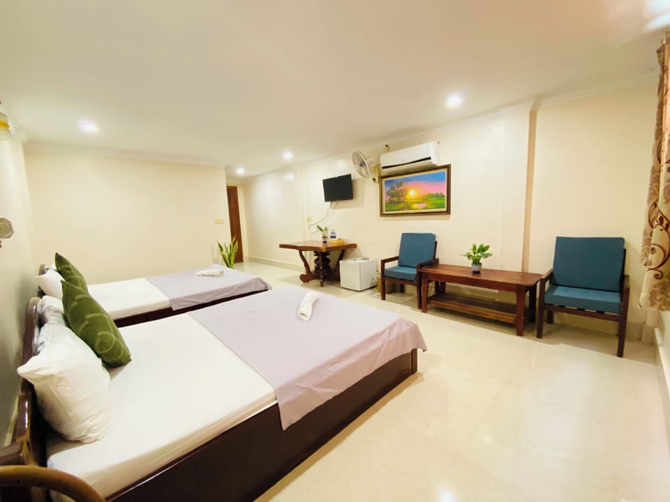 Family Room | Down comforters, desk, free WiFi, bed sheets