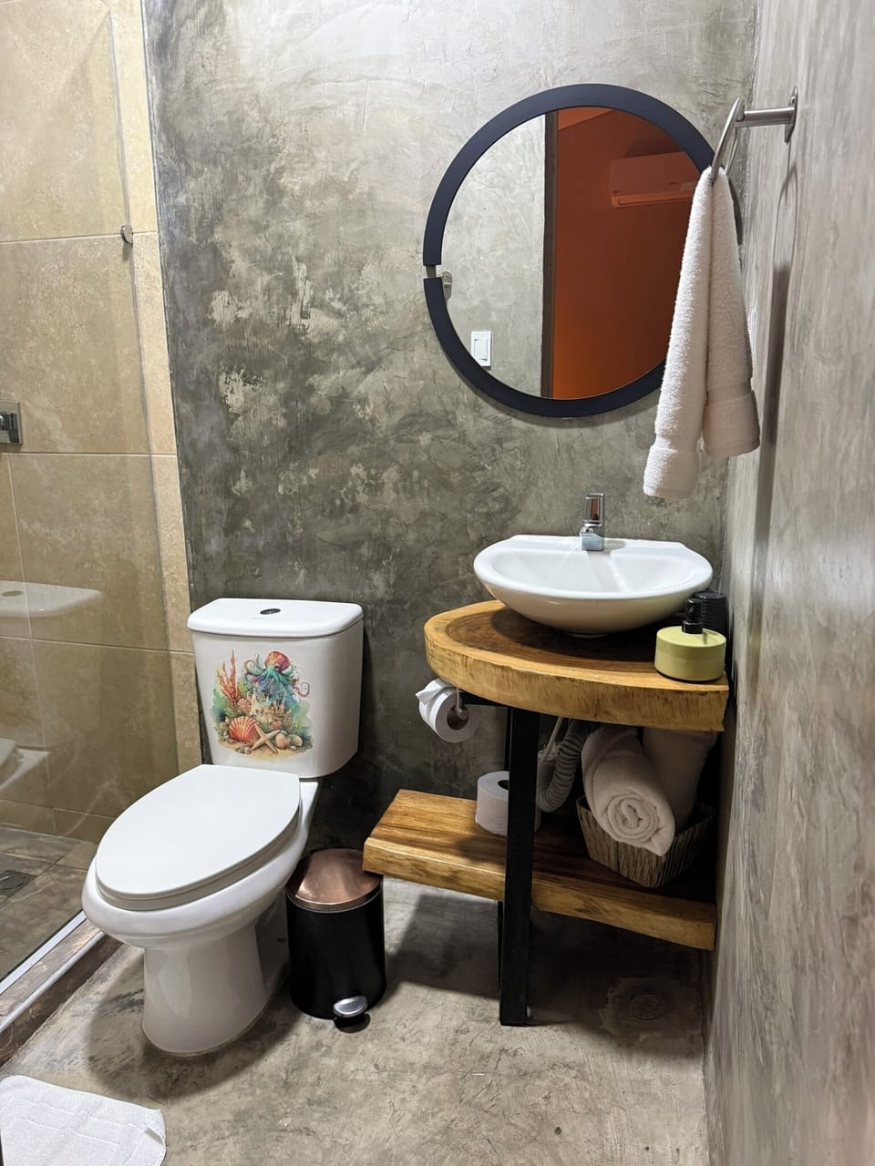 Shower, rainfall showerhead, hair dryer (on request), towels