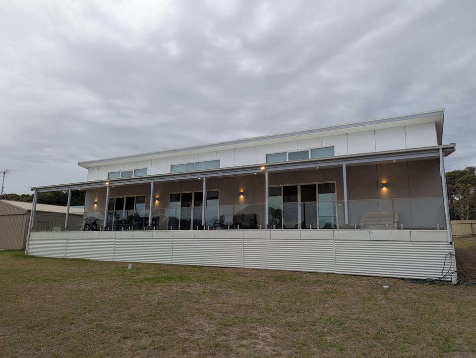 View from Buick Drive with large front set facing deck.