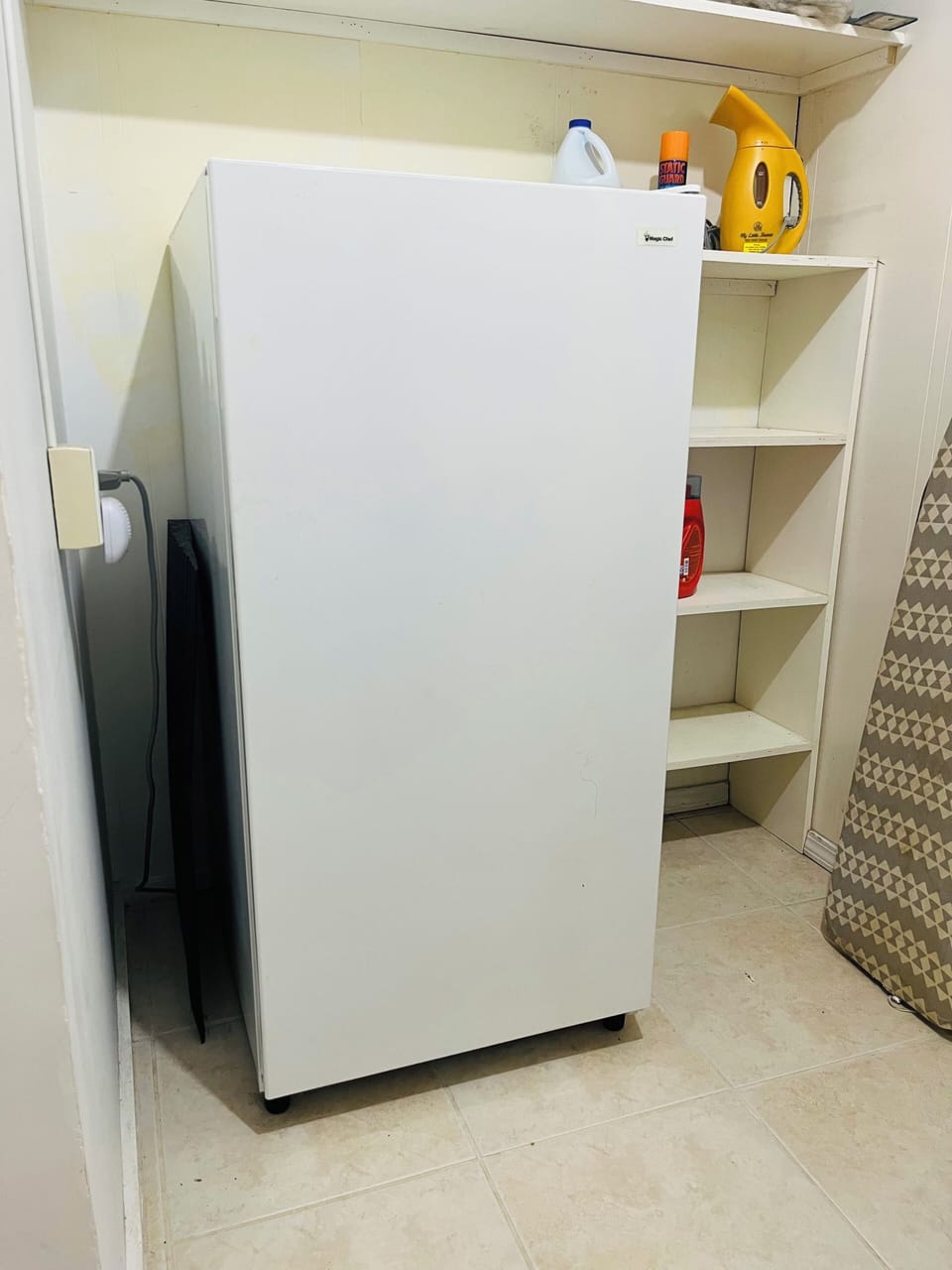 Extra freezer located in the laundry room.