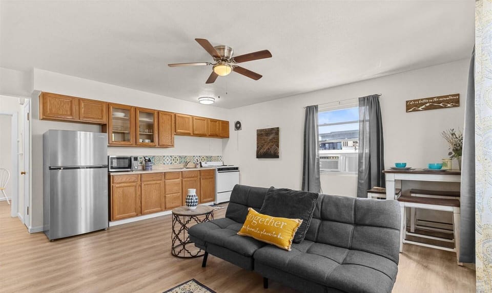 Above a coffee shop, next to an ice cream parlor, and right in the middle of everything cool.