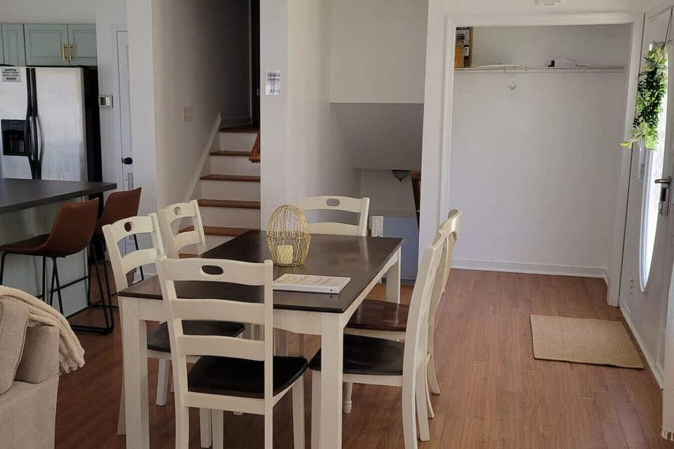 Perfectly positioned for togetherness, the dining area offers seating for six, plus an additional four bar seats at the kitchen island. The wide bar top doubles as extra prep space, making it easy to whip up and serve your favorite meals.