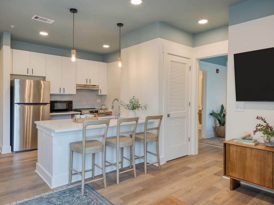 Barstool seating at the fully equipped kitchen.