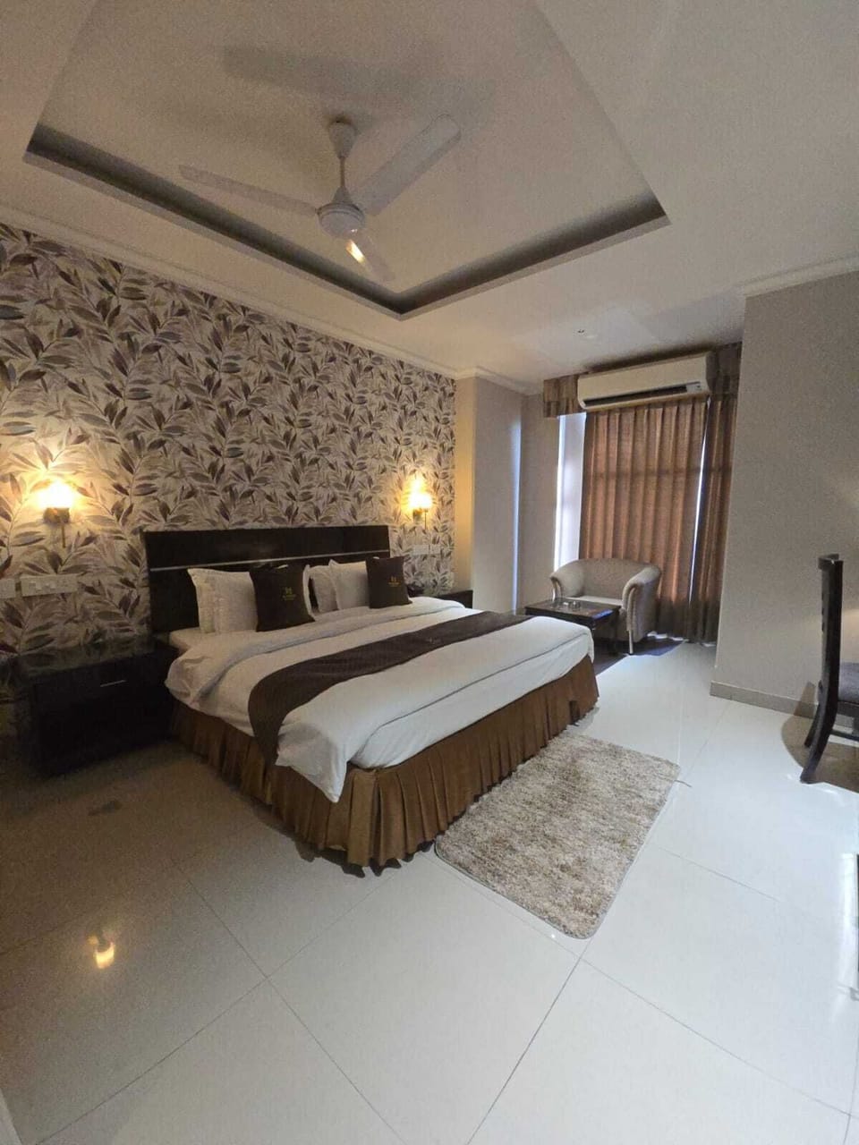 Premium bedding, desk, laptop workspace, soundproofing